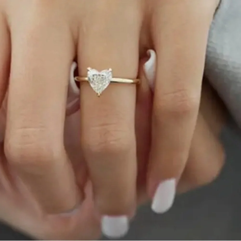 Heart Shaped Engagement Ring with Inlaid Gem
